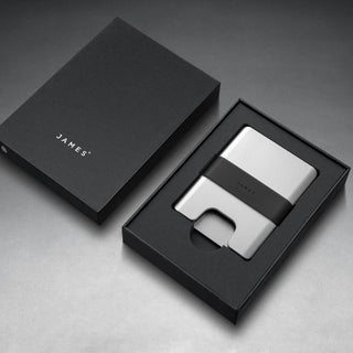James The Lowe Wallet in aluminum with black silicone band displayed in sleek black packaging
