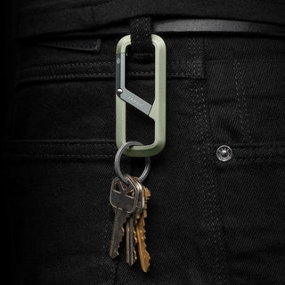 James The Madison Carabiner in olive green aluminum holding keys attached to black pants loop