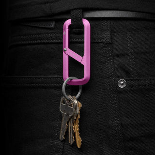 James The Madison Carabiner in purple aluminum attached to black jeans holding a set of keys