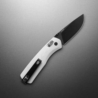James The Carter Knife with white Micarta handle and black VG-10 blade, sleek design by The James Brand