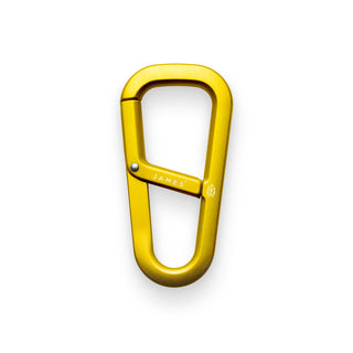James The Hardin Carabiner in anodized gold aluminum with dual compartment spring-loaded latch