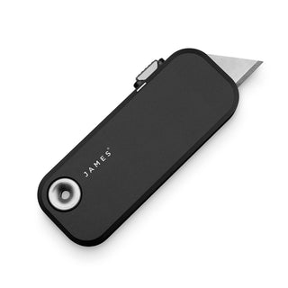 James The Palmer Knife by The James Brand with a black anodized aluminum handle and exposed blade tip