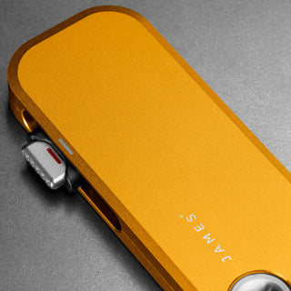 James The Palmer Knife with anodized orange 6063 aluminum handle and compact high carbon steel blade