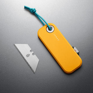 James The Palmer Knife with anodized yellow aluminum handle and sharp high carbon steel blade removed