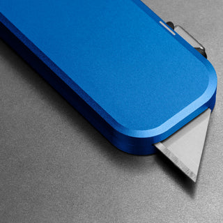 James The Palmer Knife with anodized blue aluminum handle and sharp high carbon steel blade edge