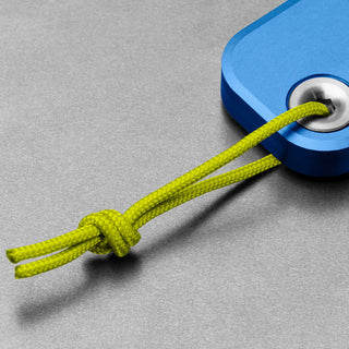 James The Palmer Knife blue anodized aluminum handle with green cord lanyard close-up detail