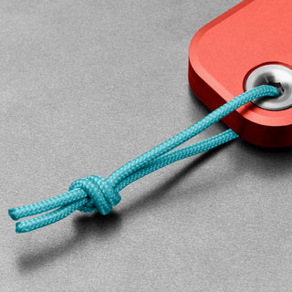 James The Palmer Knife by The James Brand with red anodized aluminum handle and braided blue cord loop