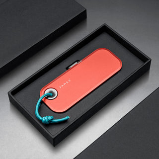 James The Palmer Knife in anodized red aluminum with blue lanyard in black presentation box by The James Brand