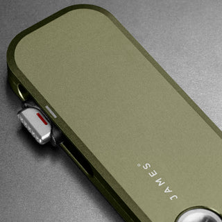 James The Palmer Knife by The James Brand in anodized olive green aluminum with compact design and sliding mechanism