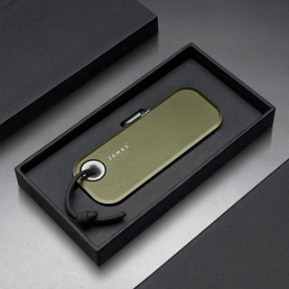 James The Palmer Knife in olive anodized aluminum case with black cord in black gift box