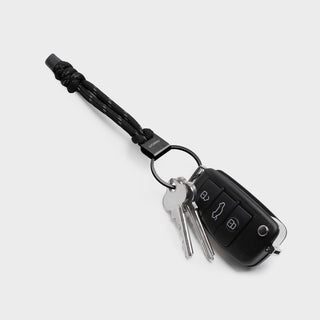 Orbitkey Urban Loop Keychain with black polyester paracord and attached keys and car remote fob