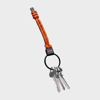 Orbitkey Urban Loop Keychain with orange polyester paracord and matte black stainless steel ring holding keys