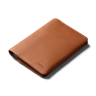 Bellroy Passport Cover in smooth tan leather with subtle stitching and embossed logo detail