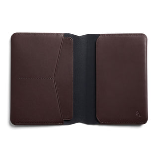 Bellroy Passport Cover in dark brown leather with multiple card slots and smooth texture interior