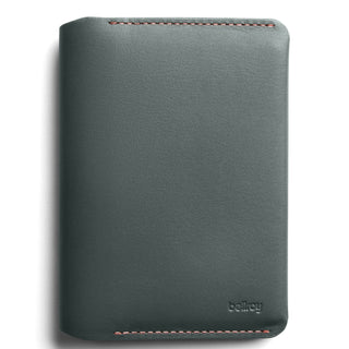 Bellroy Passport Cover in dark green leather with subtle stitching and embossed logo detail