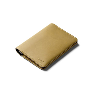 Bellroy Passport Cover in tan leather with smooth texture and subtle embossed logo on front corner