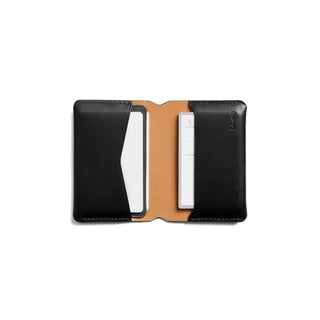 Bellroy Under Cover black leather card holder open showing interior tan lining and two card slots