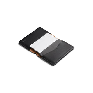 Bellroy Under Cover black leather card holder open showing multiple card slots and smooth texture
