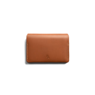 Bellroy Under Cover tan leather card sleeve with subtle embossed owl logo and neat stitching details
