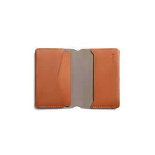 Bellroy Under Cover card holder in tan leather with stitched edges and soft inner lining visible open flat