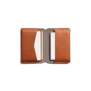 Bellroy Under Cover slim tan leather cardholder open showing multiple card slots and stitching detail