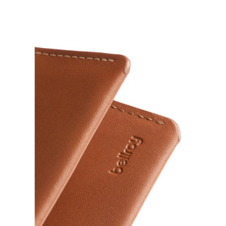 Bellroy Under Cover tan leather card sleeve showing smooth texture and embossed logo detail
