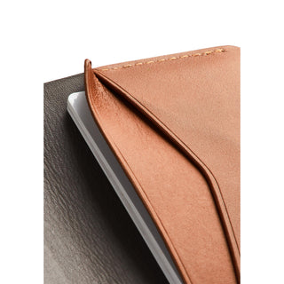 Bellroy Under Cover slim leather card holder in tan showing detailed stitching and textured surface