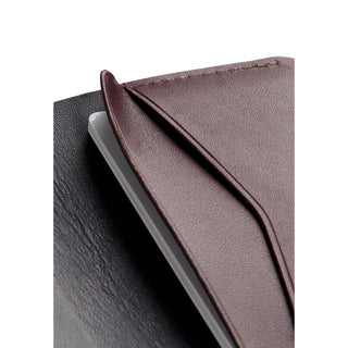 Bellroy Under Cover brown leather card holder showing smooth texture with precise stitching details