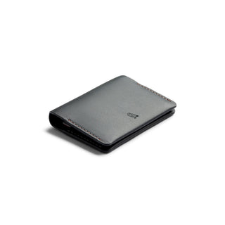Bellroy Under Cover slim black leather card sleeve with subtle embossed logo and neat stitching edges