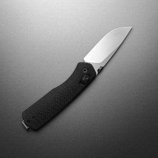 James The Carter Knife with black textured G10 handle and polished stainless steel blade closed lock mechanism visible