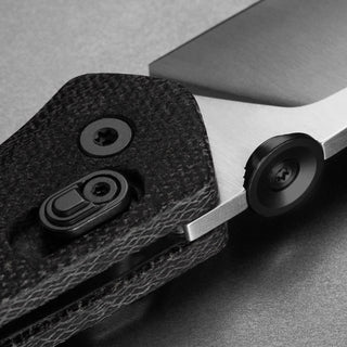 James The Carter Knife close-up showing textured black Micarta handle and polished VG-10 steel blade edge