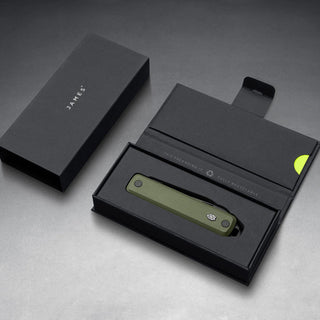James The Ellis Scissors Knife with green Micarta handle neatly presented in black packaging by The James Brand