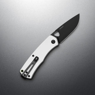 James The Folsom Knife with matte black VG-10 blade and white G10 handle by The James Brand