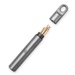 James The Randolph Capsule in titanium with stainless steel cap holding sharpened wooden toothpicks