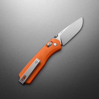 James The Carter Knife with textured orange G10 handle and sleek VG-10 blade from The James Brand