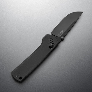 James The Kline Knife with black Micarta handle and matte drop point CPM Magnacut blade angled open