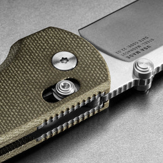 James The Kline Knife with textured Micarta handle and stainless steel drop-point blade close-up