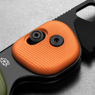 James The Redstone Knife close-up showing textured orange polypropylene handle and black hardware screws