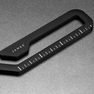 James The Rowan Multitool by The James Brand in matte black with integrated ruler detail on a dark surface