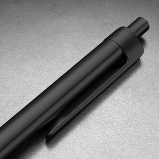 Close-up of James The Burwell Ballpoint Pen black clicker and pocket clip