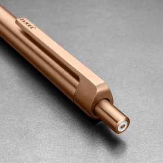 Close-up of James The Burwell Ballpoint Pen rose gold end and accent ring