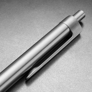 Close-up of James The Burwell Ballpoint Pen stainless clicker and pocket clip