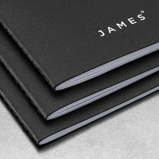 Stack of black James The Daily Notebook - 3 Pack with grey page edges