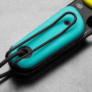 James The Redstone Knife showing turquoise polypropylene handle with black stainless steel pocket clip and lanyard loop