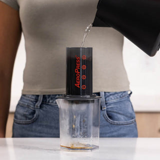 AeroPress Carafe in clear Tritan with hexagonal shape catching brewed coffee for AeroPress device