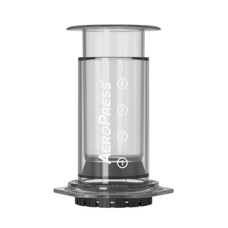AeroPress Clear Coffee Maker transparent brewing chamber showing volume measurements and seal ring detail