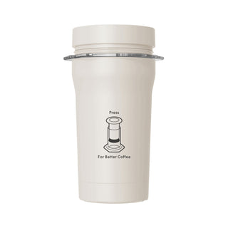AeroPress Go Plus Travel System beige cup with screw-on lid and coffee press graphic on front