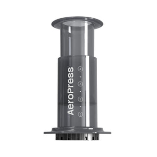 AeroPress Original Coffee Maker translucent dark gray chamber with measurement markings and plunger top