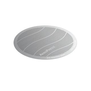 AeroPress Stainless Steel Reusable Filter with fine mesh and smooth metal finish in round shape