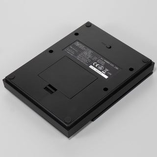HARIO Polaris Coffee Scale showing black ABS resin bottom with battery compartment and non-slip pads